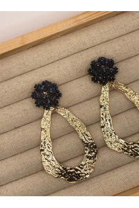 Pendientes FLORA dorados, con cabezal en negro